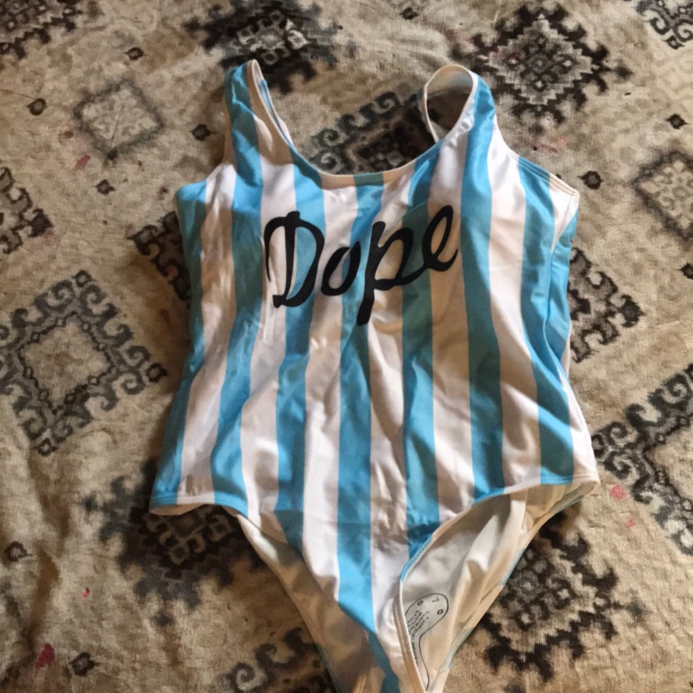 A blue & white bathing suit or a body suit